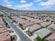 An aerial view showing a residential area with neatly arranged homes and street views at 4148 W Dayflower Dr, San Tan Valley, AZ 85144