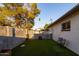 Fully fenced backyard featuring low maintenance artifical turf and patio at 4527 N 12Th Ave, Phoenix, AZ 85013