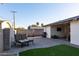 Entertainer's backyard complete with built-in BBQ, artificial turf, and covered lounge area at 4527 N 12Th Ave, Phoenix, AZ 85013