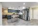 A stylish kitchen with granite countertops and stainless steel appliances showcases modern design at 4527 N 12Th Ave, Phoenix, AZ 85013