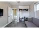 Functional living room with a large closet and convenient access to other parts of the home at 4527 N 12Th Ave, Phoenix, AZ 85013