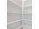 A new walk-in pantry with white wooden shelving at 4795 W Hunter Trl, San Tan Valley, AZ 85144