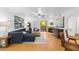Bright living room with wood floors, a fireplace, and contemporary decor, flowing into an open-concept layout at 5104 N 32Nd St # 311, Phoenix, AZ 85018