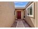 Inviting front entryway with decorative rock landscaping and a secure security screen door at 5316 S Palm Dr, Tempe, AZ 85283