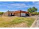 Single-story home with a red tile roof and an attached two-car garage provides ample parking at 5316 S Palm Dr, Tempe, AZ 85283