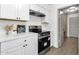 Beautiful kitchen featuring new stainless steel oven, white countertops and ample cabinet space at 5316 S Palm Dr, Tempe, AZ 85283