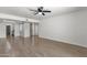 Open-concept living room with wood-look flooring and easy access to other rooms at 5316 S Palm Dr, Tempe, AZ 85283