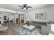 Open-concept living room with dining area, modern decor, and plenty of space for entertaining at 5316 S Palm Dr, Tempe, AZ 85283