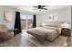 Serene main bedroom with neutral tones, access to a private patio, and comfortable furnishings at 5316 S Palm Dr, Tempe, AZ 85283
