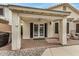Covered back patio featuring brick flooring, ceiling fan, and easy access to the inviting backyard pool at 628 N El Dorado Dr, Gilbert, AZ 85233