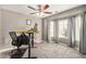Office space with a large window and neutral carpet at 628 N El Dorado Dr, Gilbert, AZ 85233