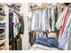 Spacious closet with built-in shelving and ample hanging storage at 628 N El Dorado Dr, Gilbert, AZ 85233