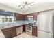 Beautiful kitchen with stainless steel appliances, blue subway tiles, and granite countertops at 6411 S El Camino Dr, Tempe, AZ 85283