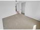 Cozy bedroom with neutral carpeting, a closet, and ample natural light at 7334 W Comet Ave, Peoria, AZ 85345