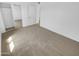 Bedroom with plush carpeting, mirrored closet, and access to en suite bath, creating a private retreat at 7334 W Comet Ave, Peoria, AZ 85345
