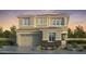 This is a charming two-story home with a stone accent, a two car garage and desert landscaping at 7670 W Crabapple Dr, Peoria, AZ 85383