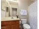 This bathroom offers a single sink vanity and shower-tub combo at 7839 E Osage Ave, Mesa, AZ 85212