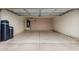 Spacious garage with cabinets and water filtration system at 7839 E Osage Ave, Mesa, AZ 85212