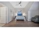 Bright bedroom with high ceilings and a ceiling fan fixture at 8245 E Bell Rd # 133, Scottsdale, AZ 85260