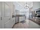 Well-lit kitchen showcasing stainless steel appliances, countertop, and ample cabinet space at 8245 E Bell Rd # 133, Scottsdale, AZ 85260