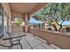 Covered patio with decorative railings and a wrought-iron table, perfect for outdoor relaxation at 8245 E Bell Rd # 133, Scottsdale, AZ 85260