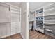 Organized walk-in closet with ample shelving and drawer space at 8245 E Bell Rd # 133, Scottsdale, AZ 85260