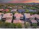 Stunning aerial view showcasing the community's well-planned layout and the homes' unique designs at 9439 E Trailside Vw, Scottsdale, AZ 85255