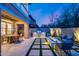 Outdoor space with a barbecue, patio, fire pit, and beautiful landscaping at 9439 E Trailside Vw, Scottsdale, AZ 85255