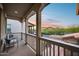 Balcony view overlooking desert neighborhood with picturesque sunset at 9439 E Trailside Vw, Scottsdale, AZ 85255