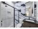 Modern bathroom with stylish tile work, glass-enclosed shower, and vanity at 9439 E Trailside Vw, Scottsdale, AZ 85255