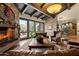 Inviting lounge area featuring a stone fireplace and comfortable seating at 9439 E Trailside Vw, Scottsdale, AZ 85255