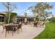 Inviting outdoor patio area with comfortable seating and lush landscaping at 9439 E Trailside Vw, Scottsdale, AZ 85255