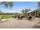 Spacious outdoor patio with ample seating, perfect for enjoying the beautiful scenery and weather at 9439 E Trailside Vw, Scottsdale, AZ 85255