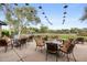 Charming outdoor patio with bistro seating and picturesque desert views, ideal for relaxing at 9439 E Trailside Vw, Scottsdale, AZ 85255
