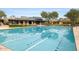 Beautiful community pool with lane lines, lounge chairs, and an inviting desert mountain backdrop at 9439 E Trailside Vw, Scottsdale, AZ 85255