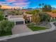 Stunning aerial perspective of the house, grounds, and surrounding community at 9760 E San Salvador Dr, Scottsdale, AZ 85258