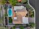 Birds-eye view of home featuring a pool, patio, and well-manicured yard, offering the ultimate in outdoor living at 9760 E San Salvador Dr, Scottsdale, AZ 85258