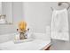 Bright bathroom showcasing a white countertop with decorative soaps and a towel rack at 9760 E San Salvador Dr, Scottsdale, AZ 85258