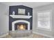 Inviting fireplace with white mantle and charming decor, perfect for cozy evenings at 9760 E San Salvador Dr, Scottsdale, AZ 85258