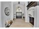 Bright, airy foyer with high ceilings and stylish decor, offering a grand entrance at 9760 E San Salvador Dr, Scottsdale, AZ 85258