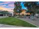 Charming home with beautifully landscaped front yard, mature trees and a welcoming facade at 9760 E San Salvador Dr, Scottsdale, AZ 85258
