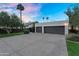 Spacious two-car garage with driveway and basketball hoop, offering ample parking space at 9760 E San Salvador Dr, Scottsdale, AZ 85258