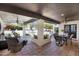 Inviting outdoor living space with comfortable seating and a covered patio, plus a view of the pool at 9760 E San Salvador Dr, Scottsdale, AZ 85258