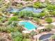 Aerial view of the community pool and tennis courts, showcasing the resort style amenities at 10219 E Le Marche Dr, Scottsdale, AZ 85255