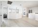 Bright loft area with wood flooring and access to other rooms, creating an open and inviting space at 10219 E Le Marche Dr, Scottsdale, AZ 85255