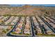 Primary-planned community showcasing well-maintained homes against a mountain backdrop at 10260 W Pinnacle Vista Dr, Peoria, AZ 85383