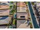 Aerial view of neighborhood homes, featuring a private backyard pool at 10260 W Pinnacle Vista Dr, Peoria, AZ 85383