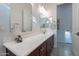 Modern bathroom featuring a vanity with sink, ample counter space, and decorative lighting at 10260 W Pinnacle Vista Dr, Peoria, AZ 85383