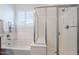 Inviting bathroom with separate shower, soaking tub, and white and chrome fixtures at 10260 W Pinnacle Vista Dr, Peoria, AZ 85383