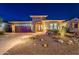 Stunning home featuring desert landscaping, paved driveway, and a cozy front porch at 10260 W Pinnacle Vista Dr, Peoria, AZ 85383
